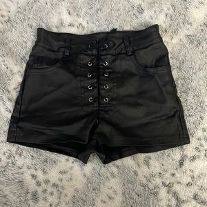 Crisscross high rise black shorts